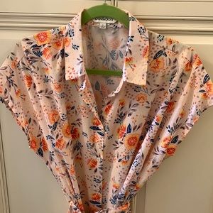 42” in front, 43.5”in back, matching fabric belt, convenient slim waist pockets.